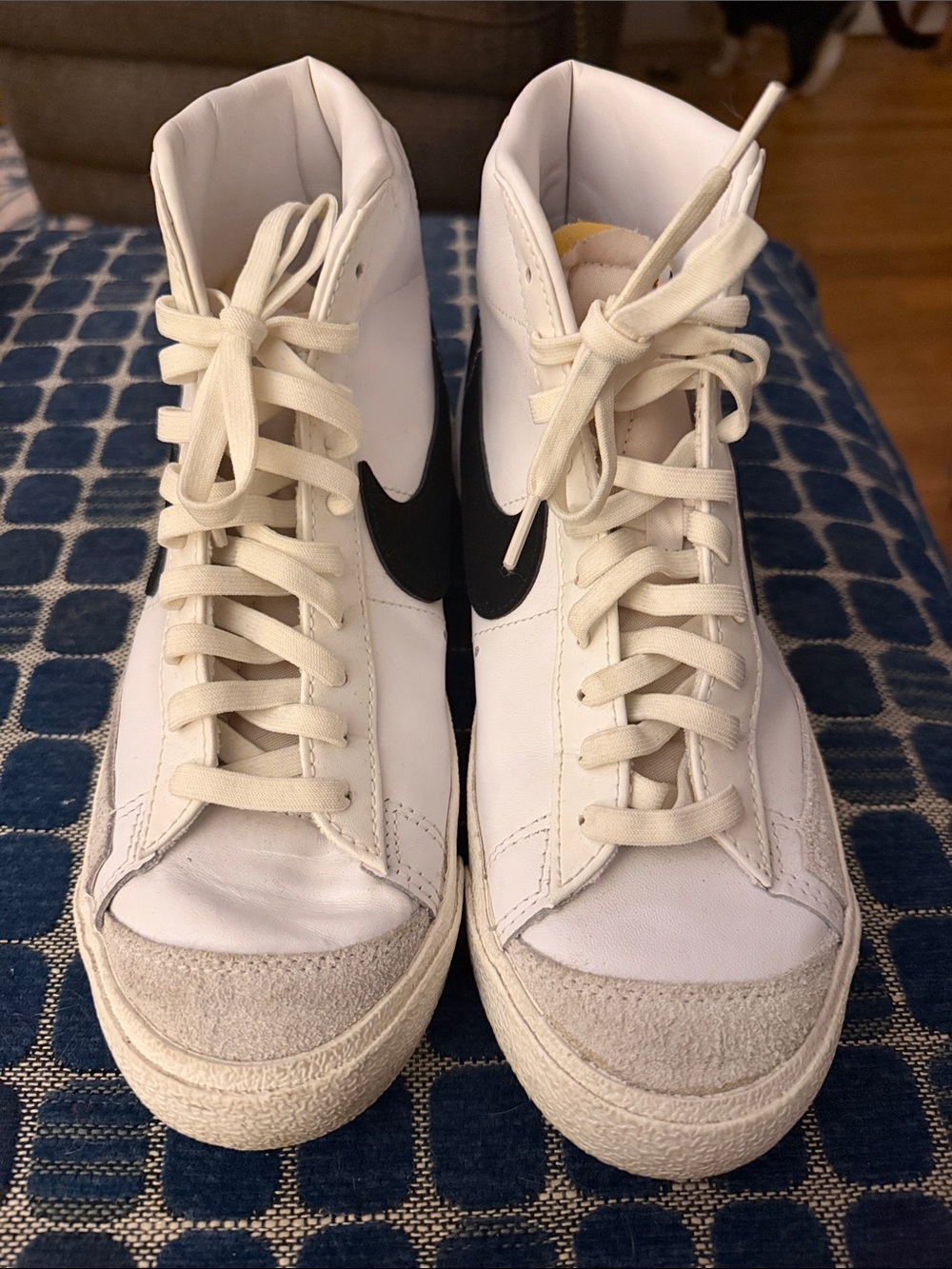 Nike White High-Top Sneakers with Black Swoosh